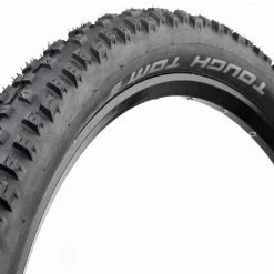 Pneu VTT Tough Tom Schwalbe 26/27.5/29 Pouces -Pas Cher Vélo Magasin pneu schwalbe Tough Tom K Guard jante 1024x1024 cb208213 81ef 429e 8913 bf50aebbda70